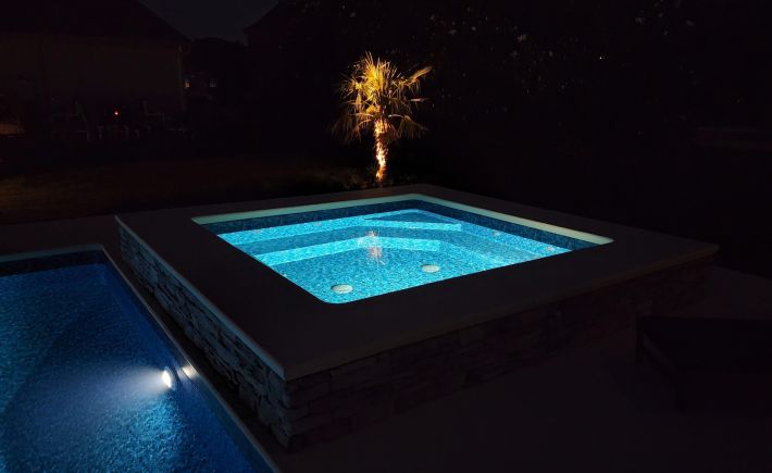 Why You Should Add a Hot Tub to Your Custom Pool